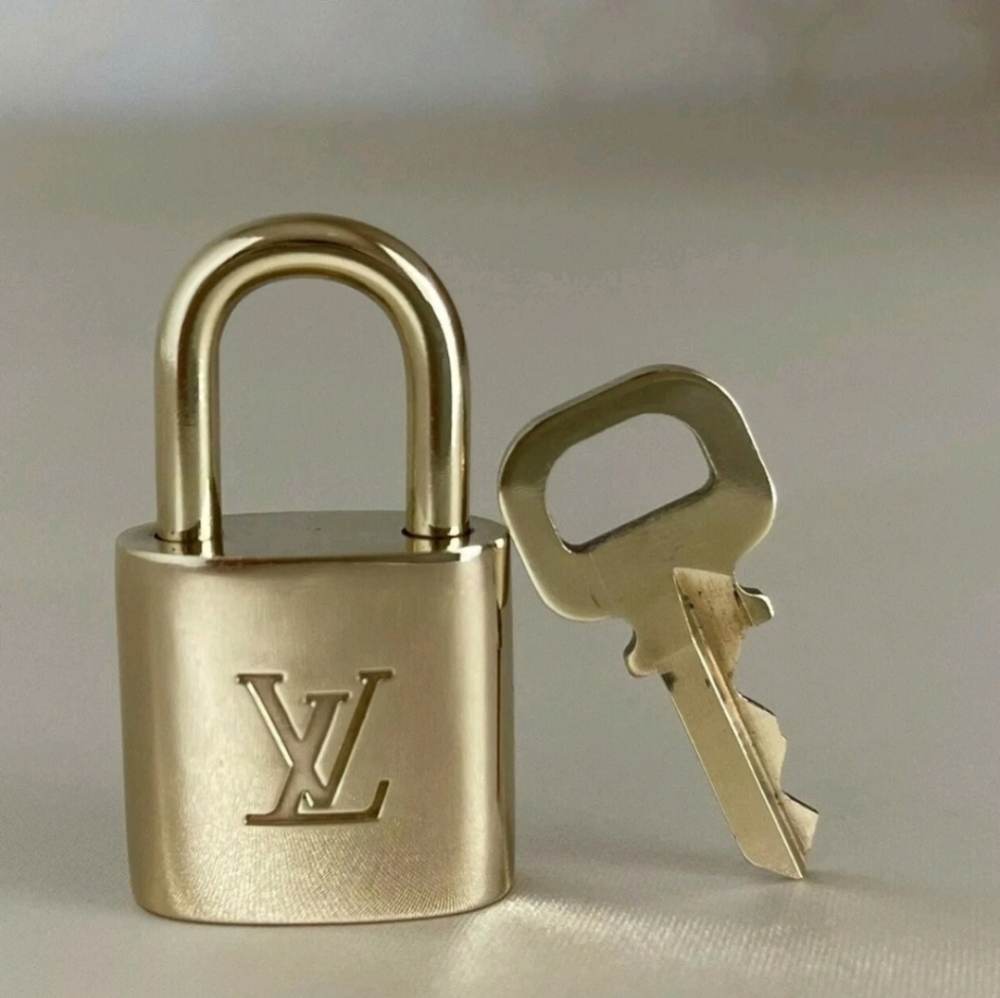 Authentic LOUIS VUITTON Padlock and Key Gold